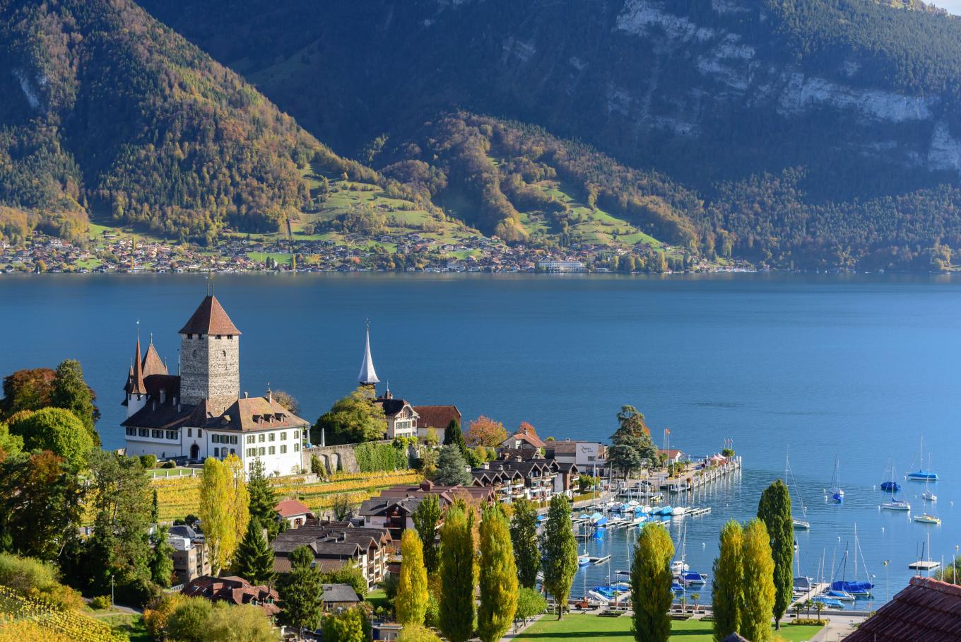 Beautiful landscape of lake Thun in Switzerland during autumn season from Spiez train station