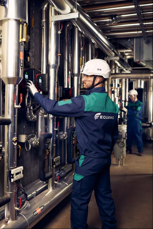 a worker in PPE working alone on HVAC system