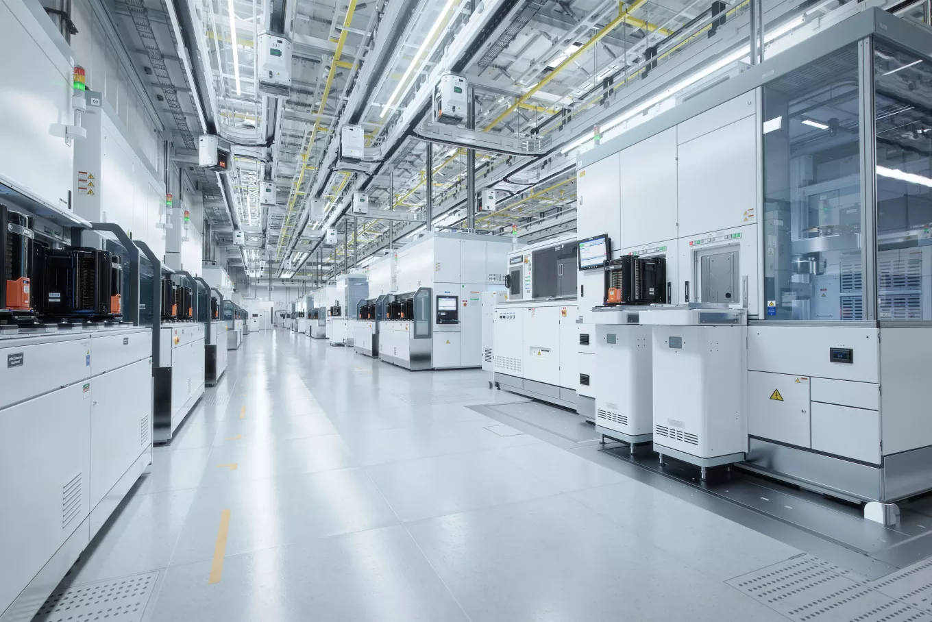 Wide Shot of Bright Advanced Semiconductor Production Fab Cleanroom with Working Overhead Wafer Transfer System