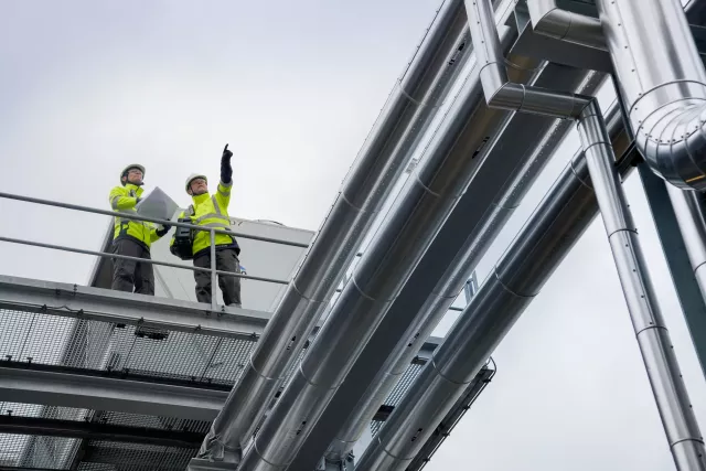 workers walking around Gas Pipe