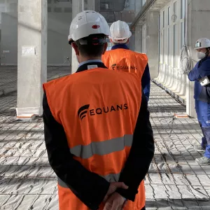 man with equans shirt