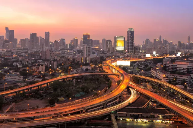 Modern office buildings, condominium in big city downtown with Motorway, Expressway, Freeway the infrastructure for transportation in modern city,